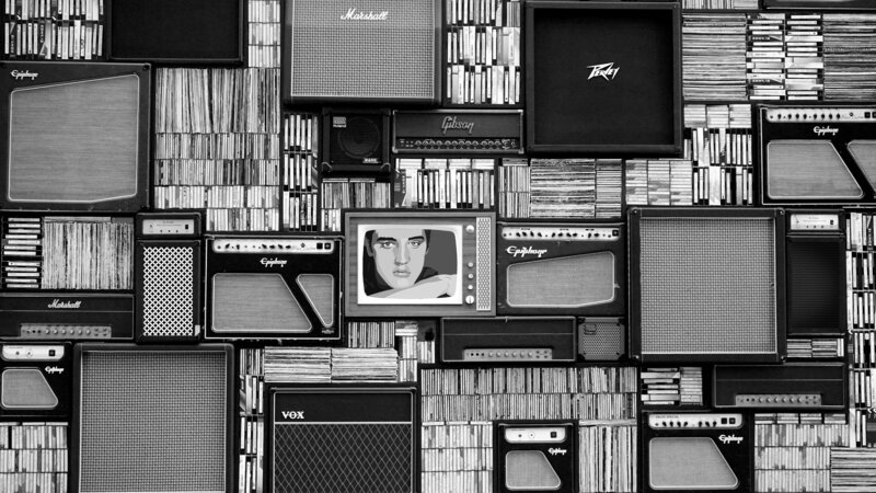 Illustration of Elvis on a vintage TV, surrounded by musical and artistic instruments, representing community support and inspiration.