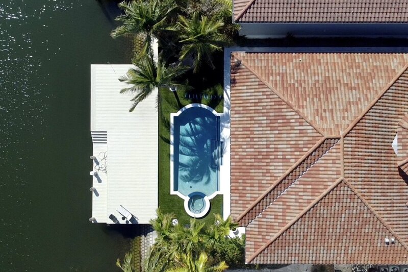 View of swimming pool and spa