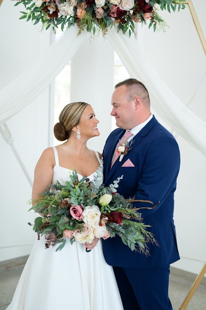 Bride and groom walk up memorial steps at their DC wedding