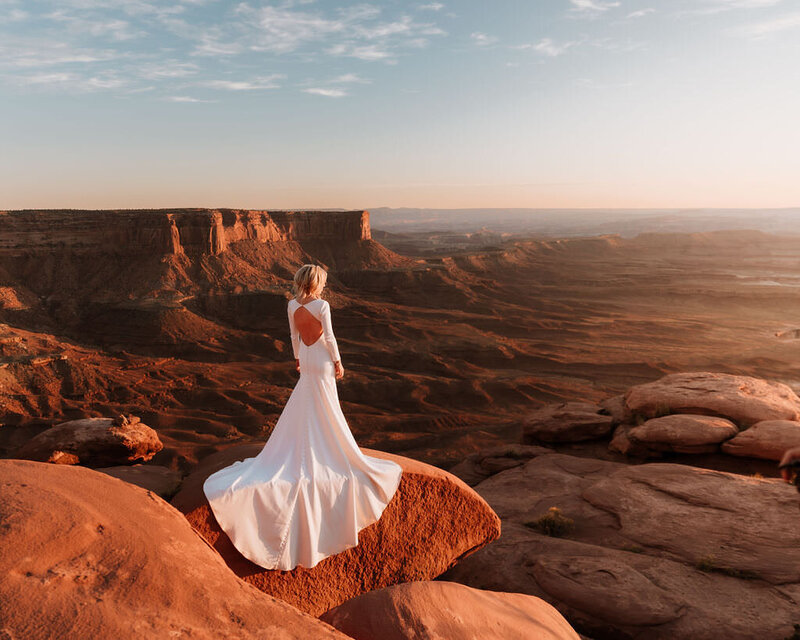 bride looking out at the sunset