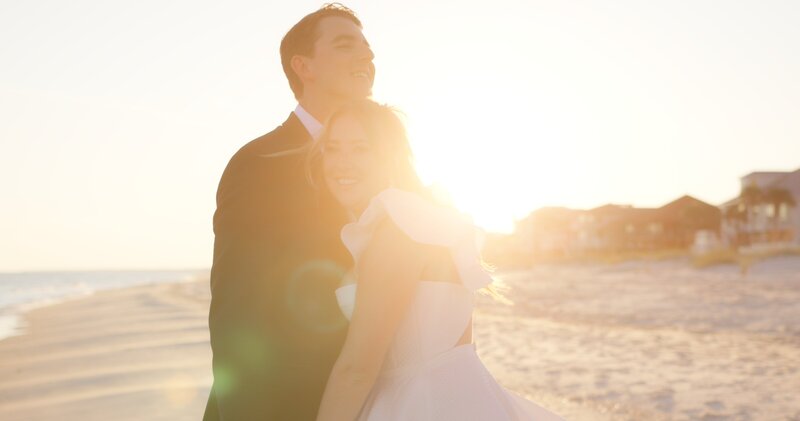 couple on beach during golden hour