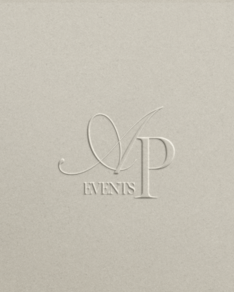 Embossed monogram logo for Always Present Events, created by Her Higher Standard Design Studio in Phoenix to communicate elegance, legacy, and emotional connection.