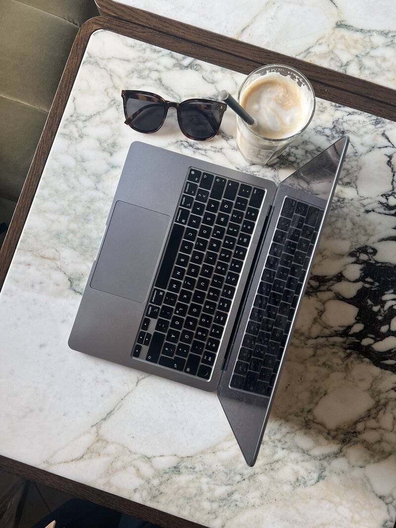 Liv Rollings sitting in cream colored chair