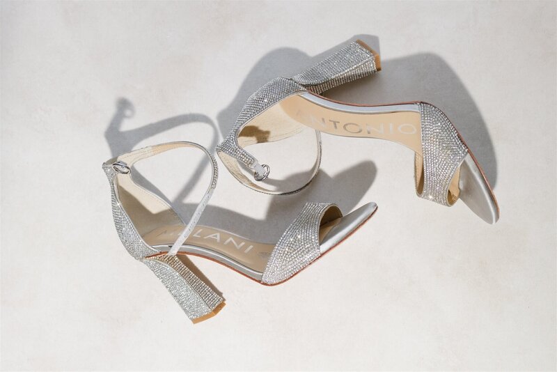 sparkly wedding heels on a flat lay
