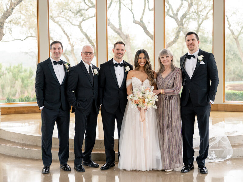Family portraits at Canyonwood Ridge with Hill Country backdrop