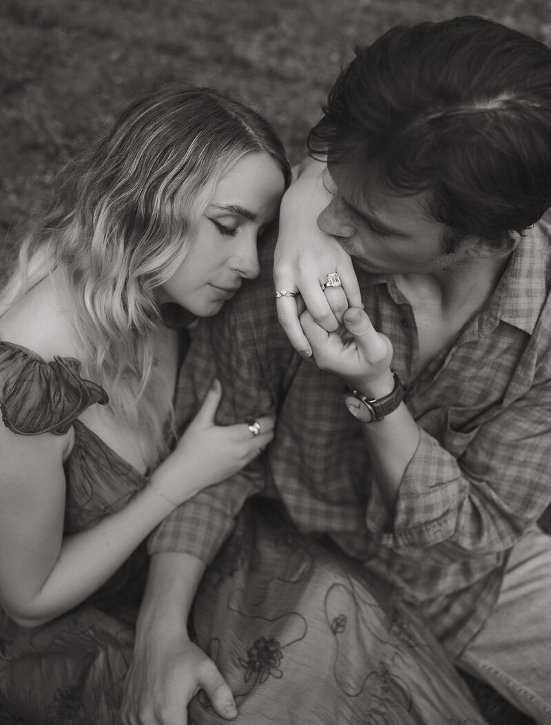 couple holding each other during engagement photos for a sweet quiet moment