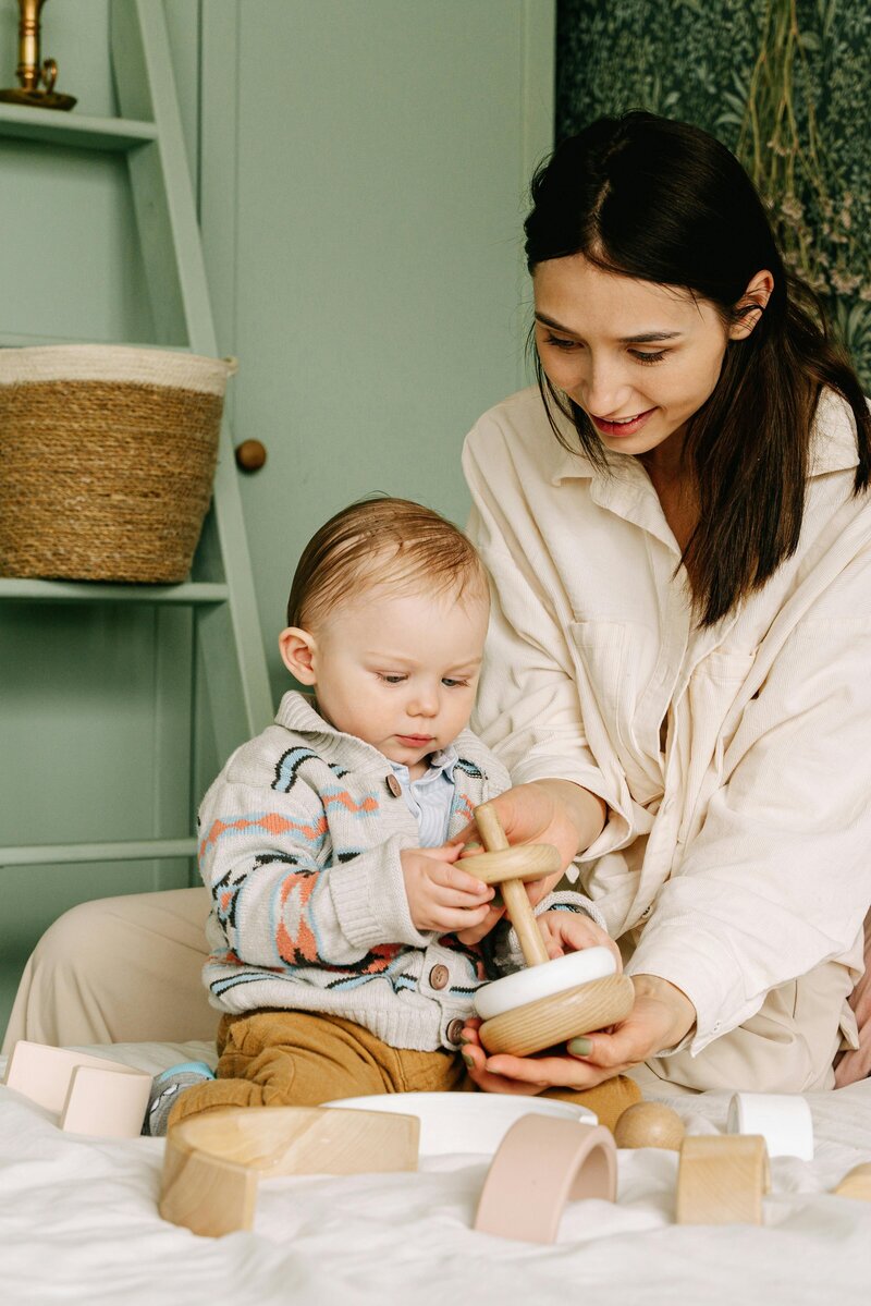 Bright indoor playroom with age-appropriate toys and equipment