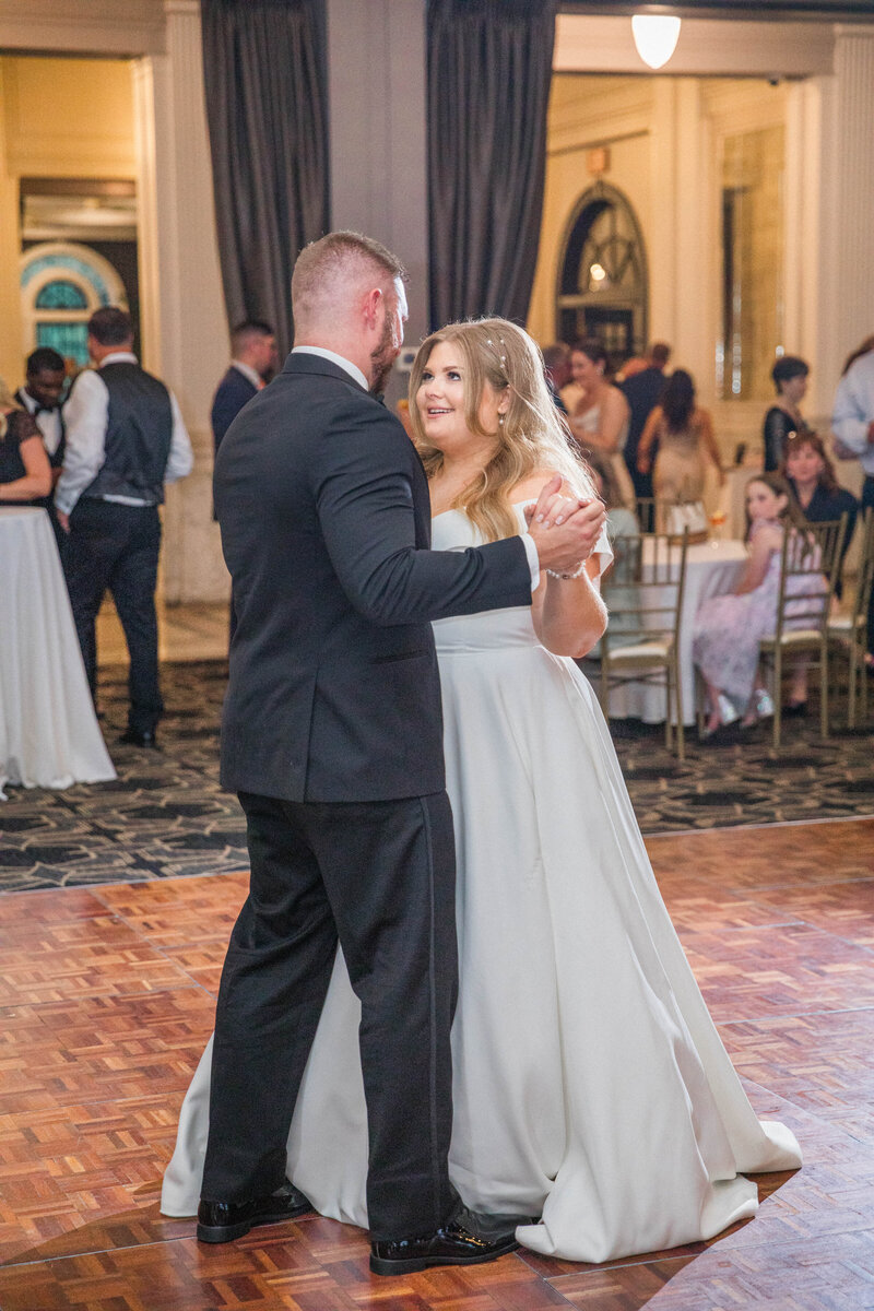 bride and groom first dance at a black tie wedding