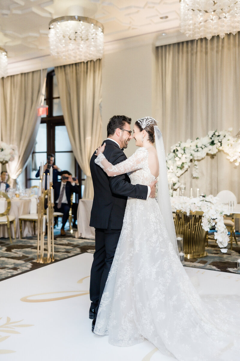 Bride and groom at their wedding reception at the four seasons Orlando by Florida wedding photographer.
