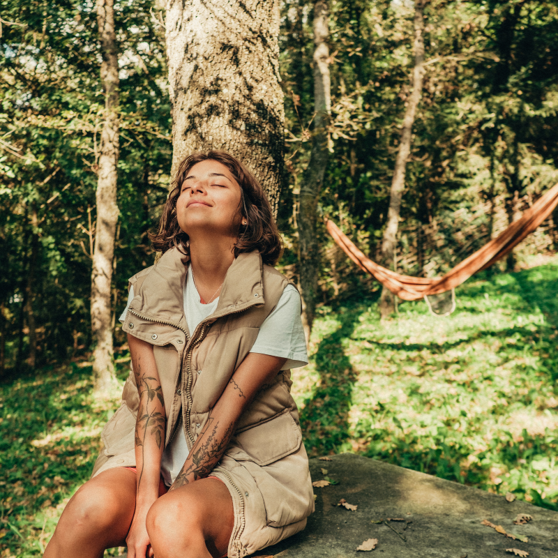 woman-in-nature-looking-happy