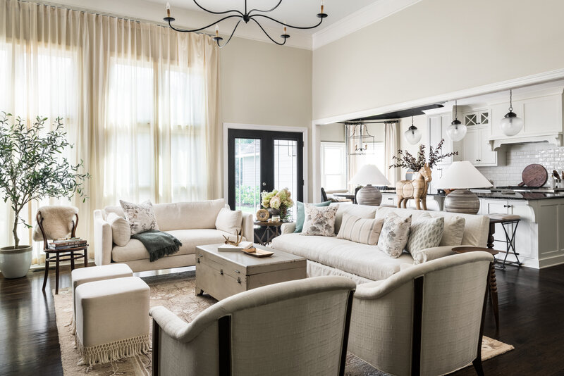 Cozy living room in Lake Norman, NC, with plush seating, neutral tones, and elegant decor.