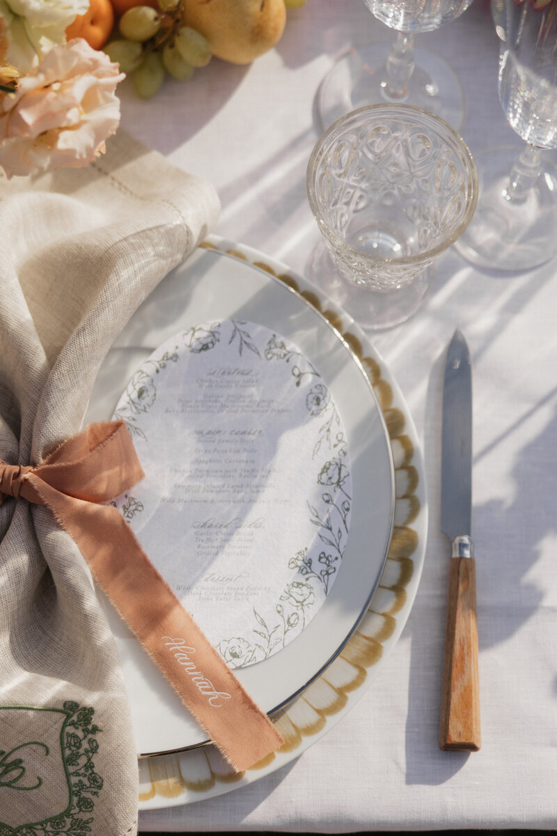Calligraphy ribbon place cards for Hannah Godwin and Dylan Barbour's rehearsal dinner