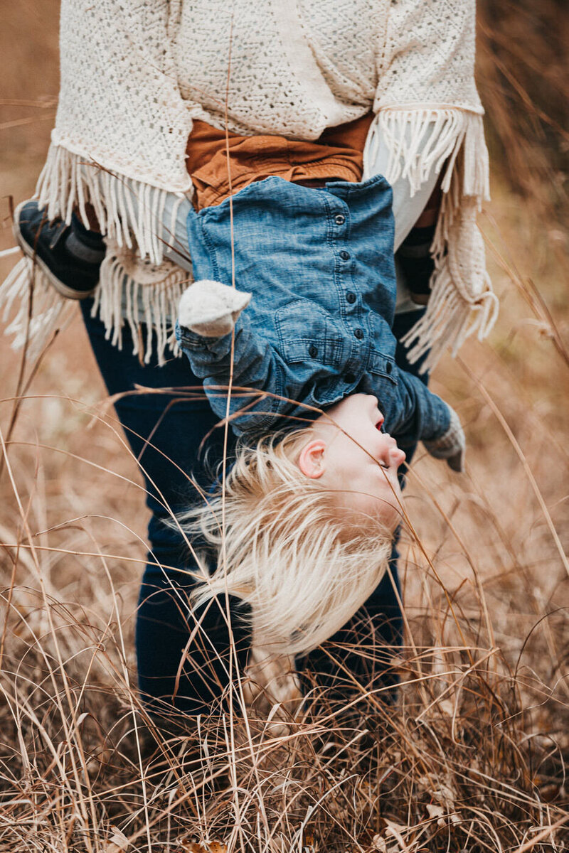 Relaxed family photos in fall at Henteleff Park, mom with son 