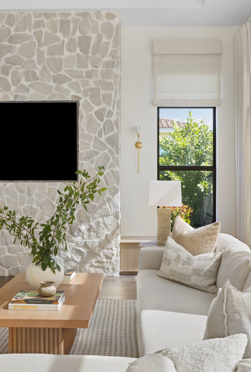 Sitting Room Featuring a White Boucle Chair