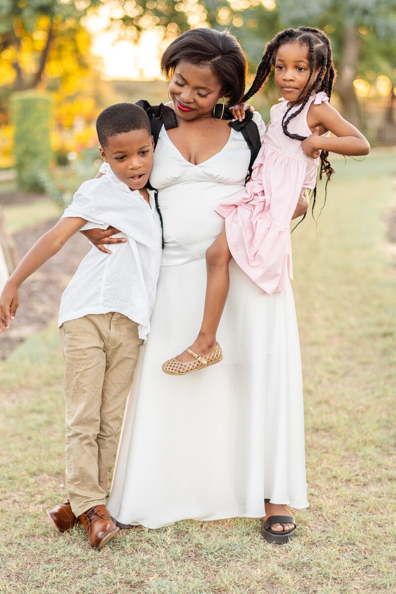 mom and kids session in rose garden