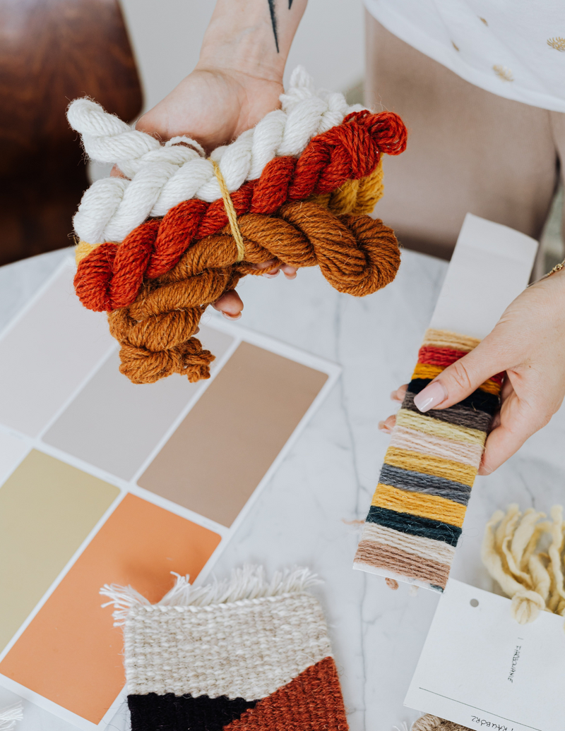 Online interior decorator moodboard with fabric, timber, and paint samples