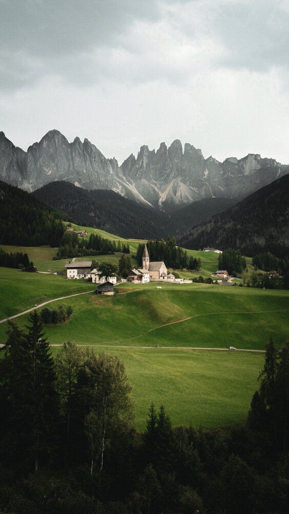 Church of St. Magdalena in the middle of the Val di Funes mountain valley 