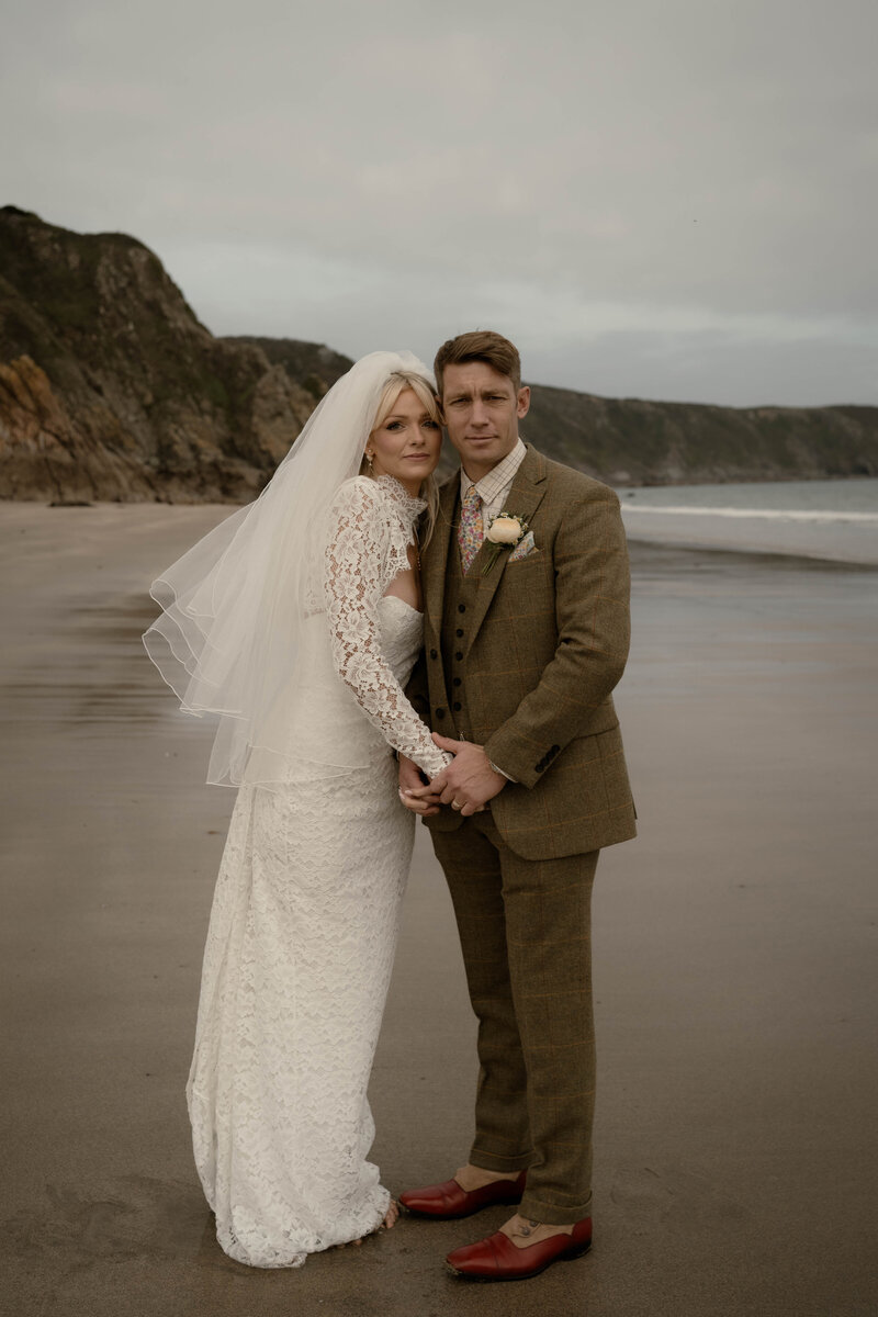 Couple portrait by the lake, captured at a Lake District wedding