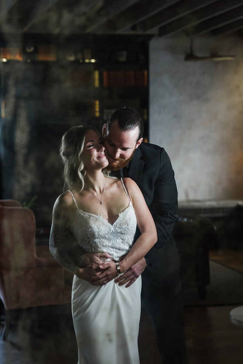 Bridal party captured naturally while enjoying their time together at a wedding in Charleston.