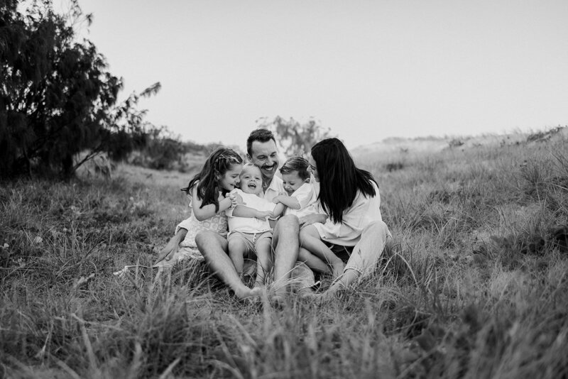 Cumner family in the grass