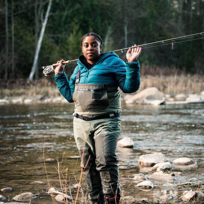 woman holding fishing rod