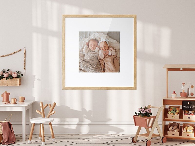 Framed heirloom newborn photo in nursery by Kindred Photography Vancouver Newborn Photographer