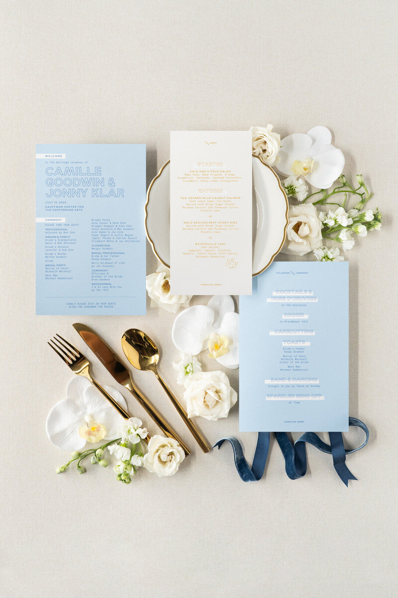Bride and groom holding vow books