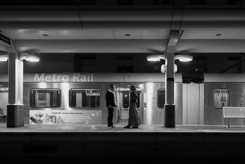 Candid metro rail wedding photo by Southern California wedding photographer