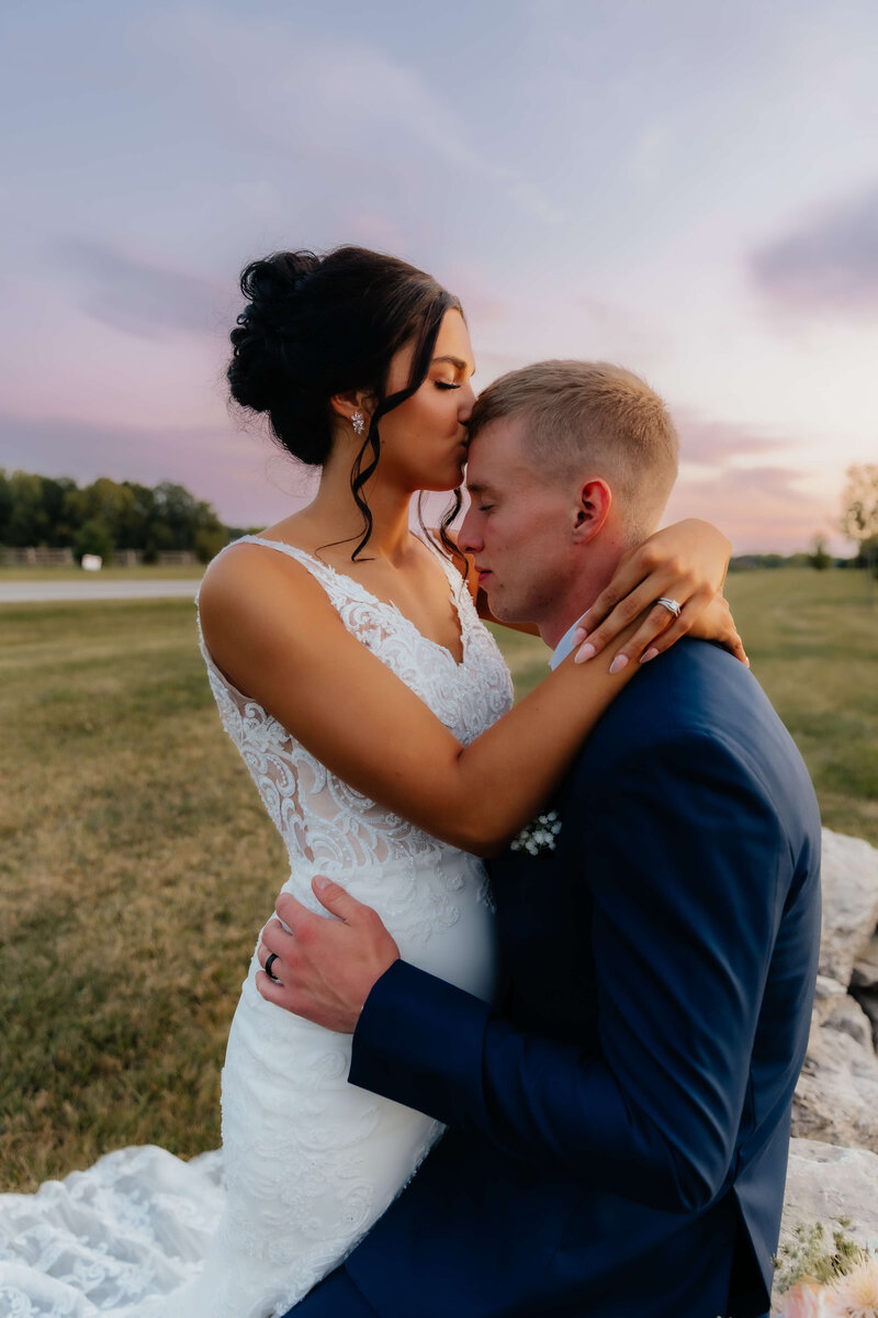 Romantic sunset wedding photo in Ohio, perfect for couples looking for natural light wedding photography with a storytelling, whimsical vibe.