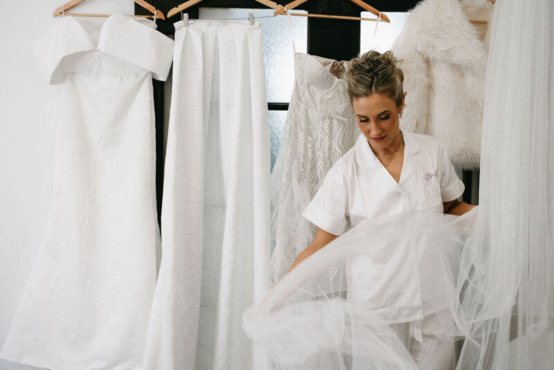 Brittney Paige Couture, custom designed wedding gowns, bride getting ready