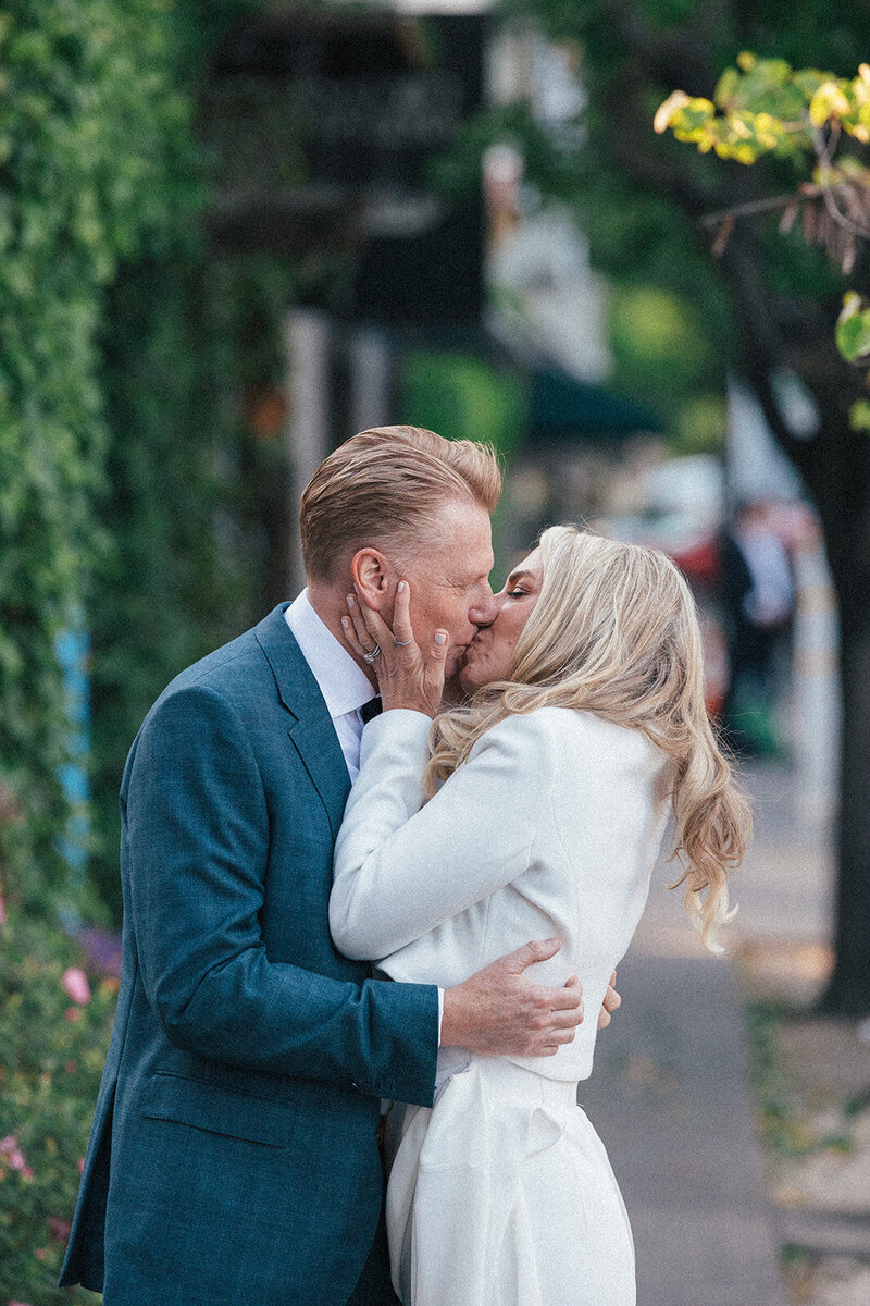 bride and groom kissing
