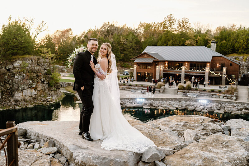 groom dips bride and kisses her