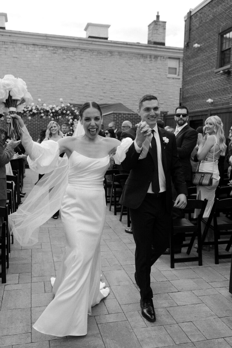 Buffalo New York Bride and Groom celebrating after their ceremony