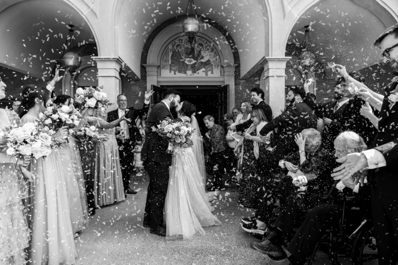 Bride and Groom Kissing in front of the Greek Church in London, Ontario