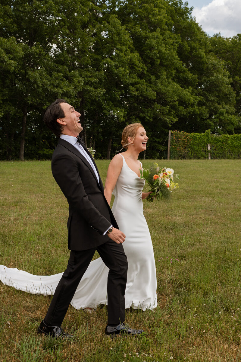 Couple laughing on their wedding day at Gather Greene.