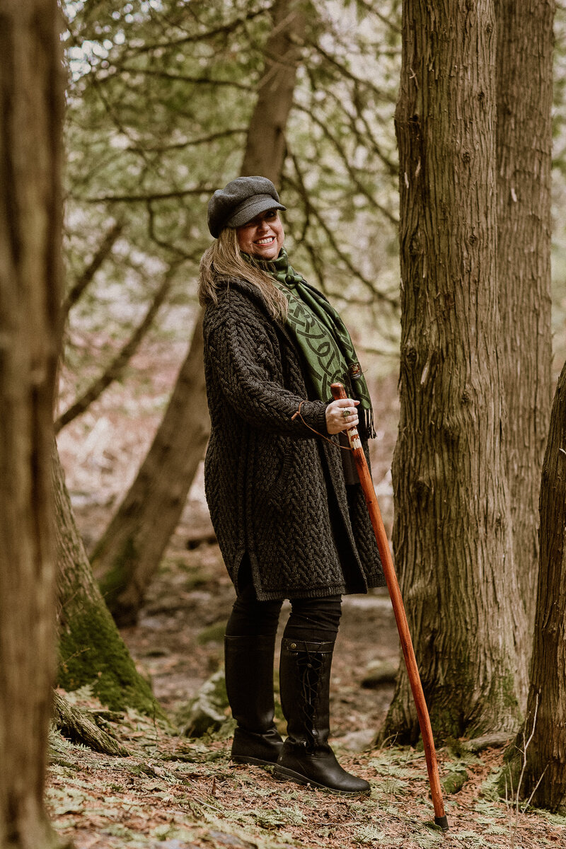 woman walking mindfully in forest, nature therapy
