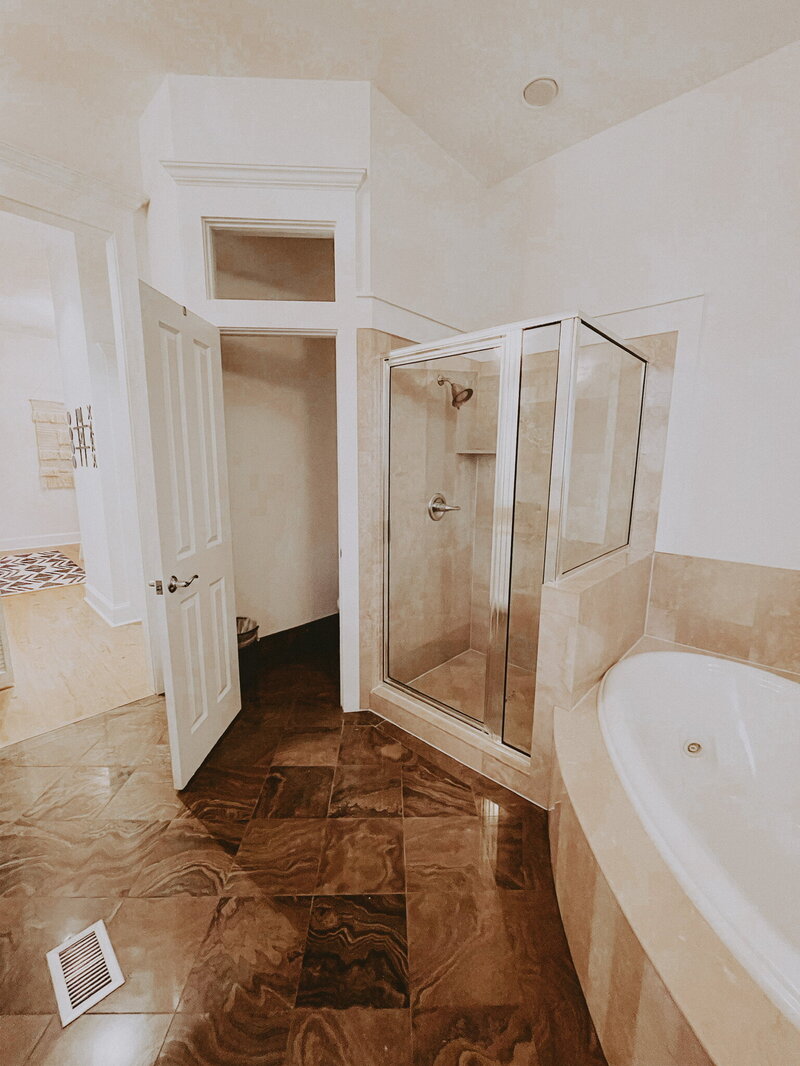 white bathroom with tile floors