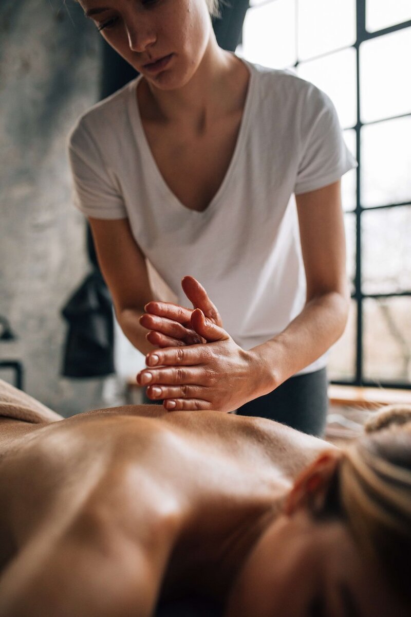 Shiatsu massage is a traditional Japanese therapy using rhythmic finger, palm, and elbow pressure along the body’s meridian lines to balance energy and promote healing.