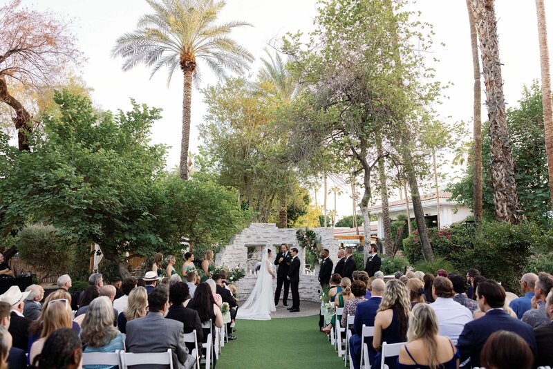 Wedding ceremony with tropical flowers at the Scott Resort in Scottsdale, Arizona.