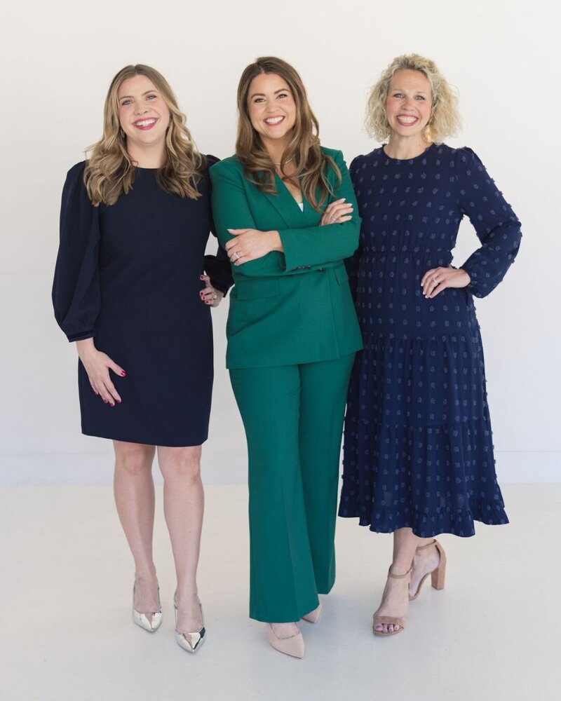 Brianna Castillo, Keelie Luttrell, and Carolyn Herndon of Haven Realty Group, standing together for a team photo representing Dallas’s trusted, faith-led real estate experts.