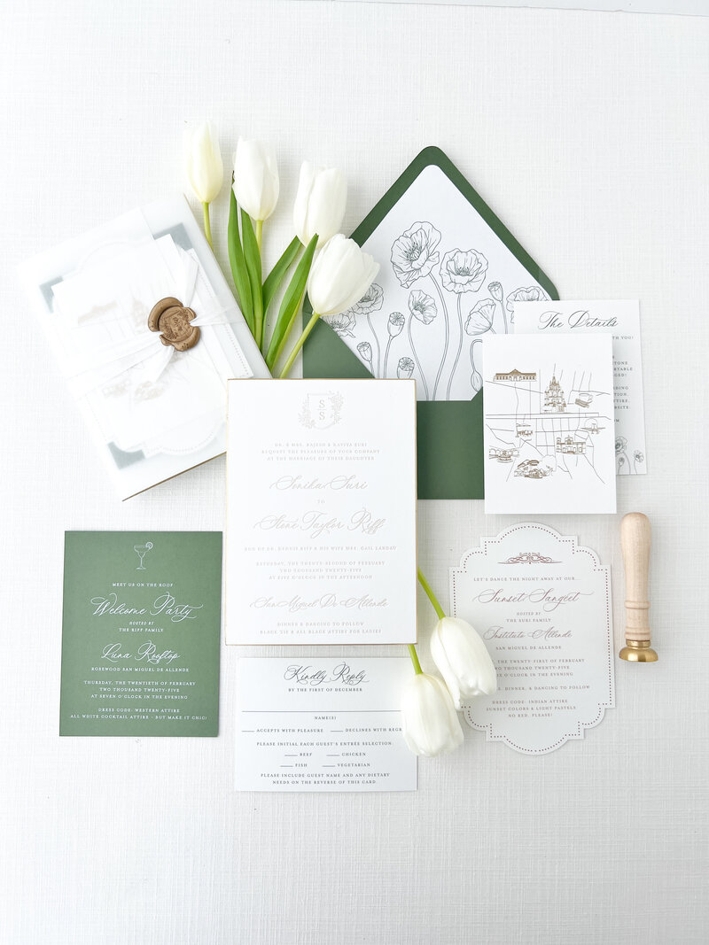 minimal wedding invitations with botanical illustrations and green and brown accent colors