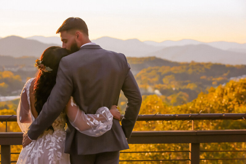 A couple embraces after their Wedding day at the Asheville Crest Center.