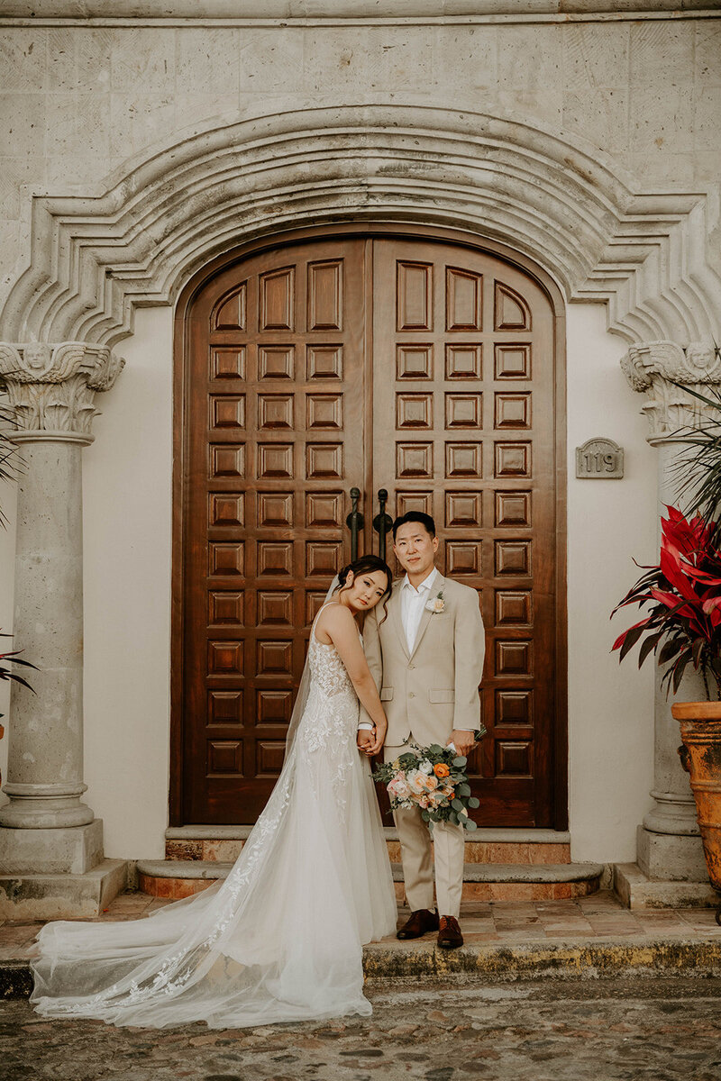 bride and groom posing