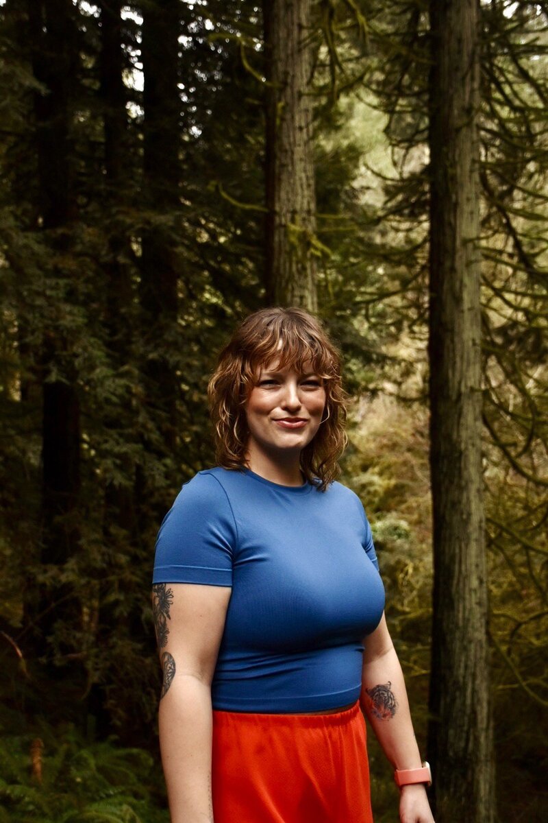 Professional headshot photo of queer romance author Lexie A. Lynn