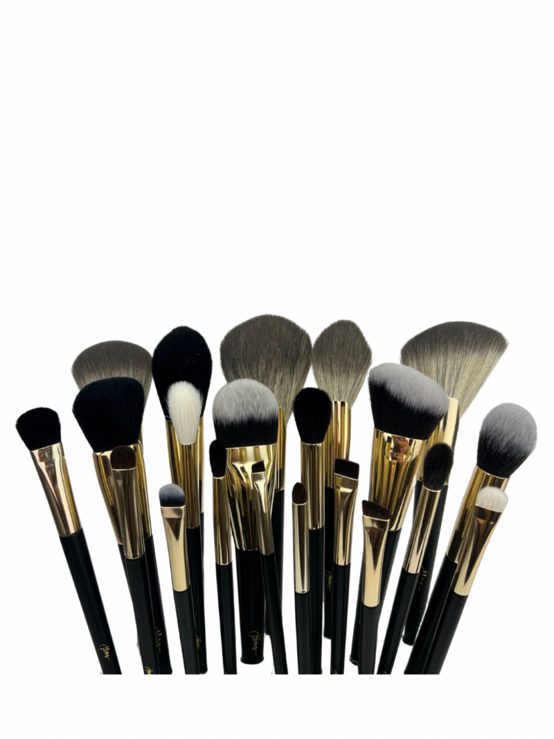Black makeup brushes of all shapes and sizes.