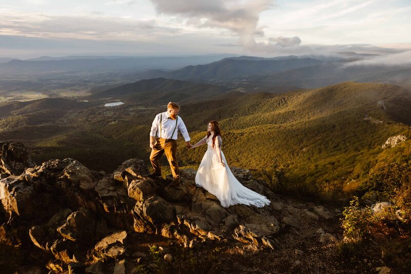 Bride and Groom kiss on a cliff during their Acadia National Park elopement.