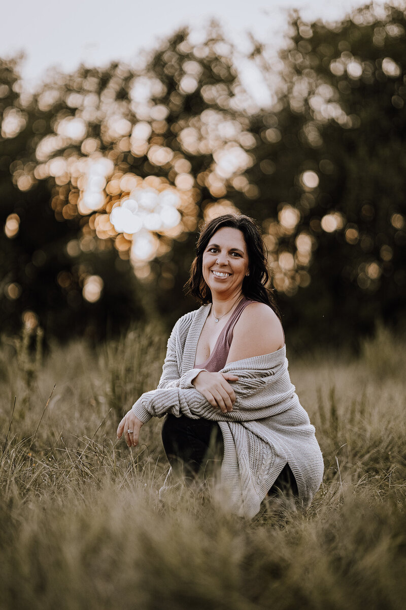 photographer outside during sunset for a headshot session