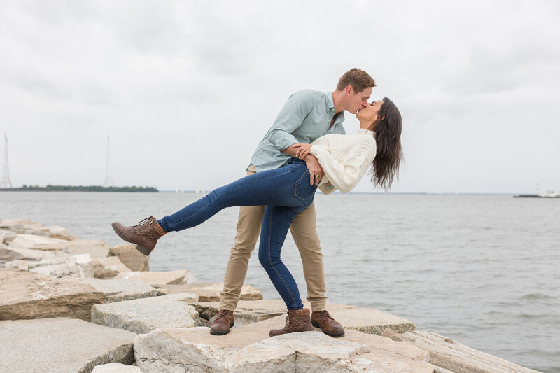 Downtown Annapolis Naval Academy engagement photos at seawall by Christa Rae Photography