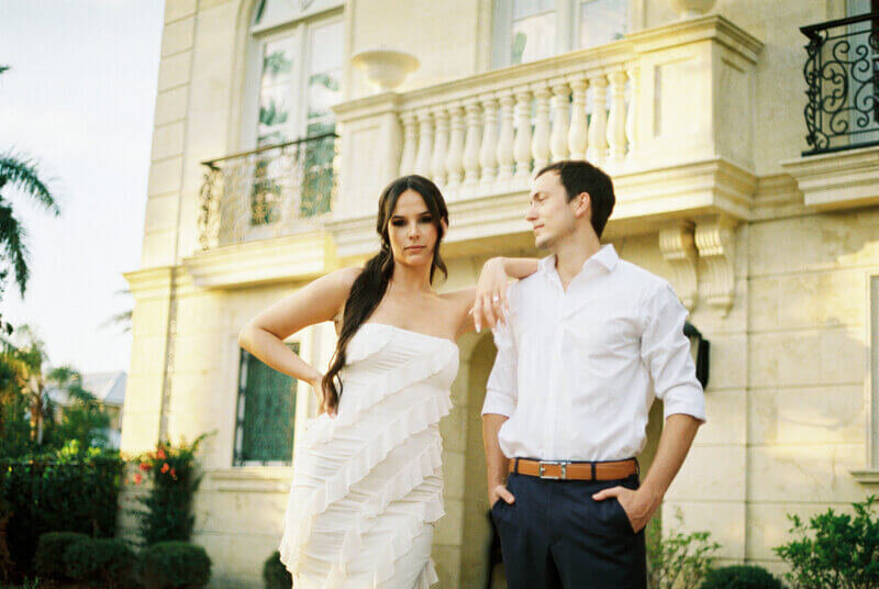 groom looking at bride taken by wedding photographers in south florida