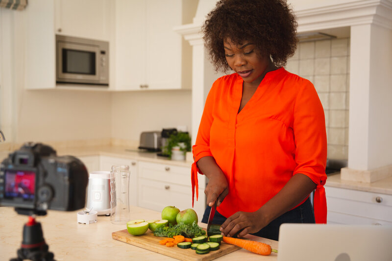 happy-african-american-woman-standing-in-kitchen-p-2025-04-03-00-50-41-utc